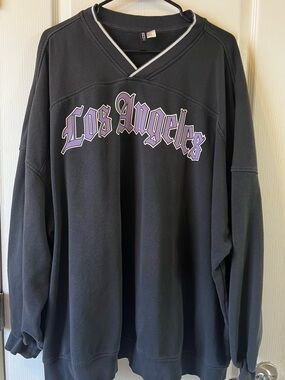 H&M LA Black v-Neck Pullover with Purple & White Trim